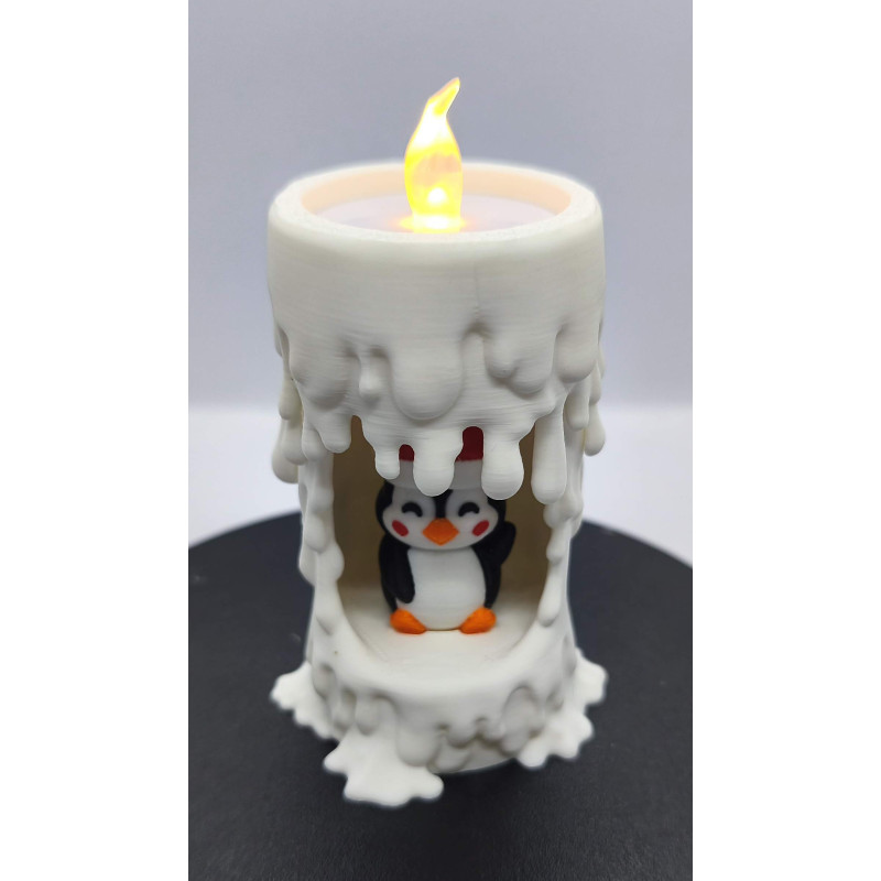 Bougie lumineuse et son petit pingouin