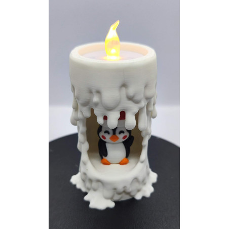 Bougie lumineuse et son petit pingouin
