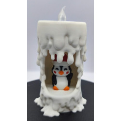 Bougie lumineuse et son petit pingouin