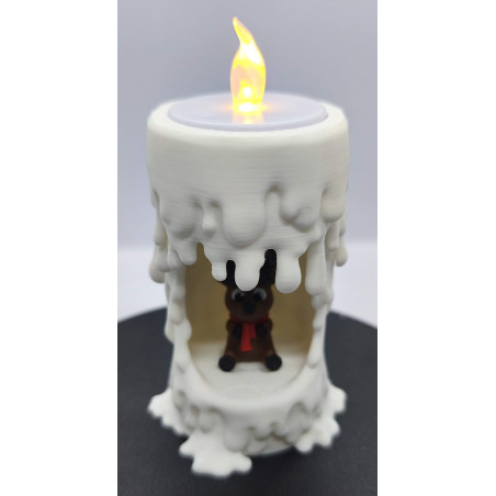 Bougie lumineuse et son petit renne